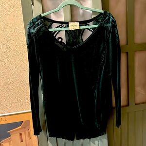 Free People dark forest green top with lace in back and over shoulders